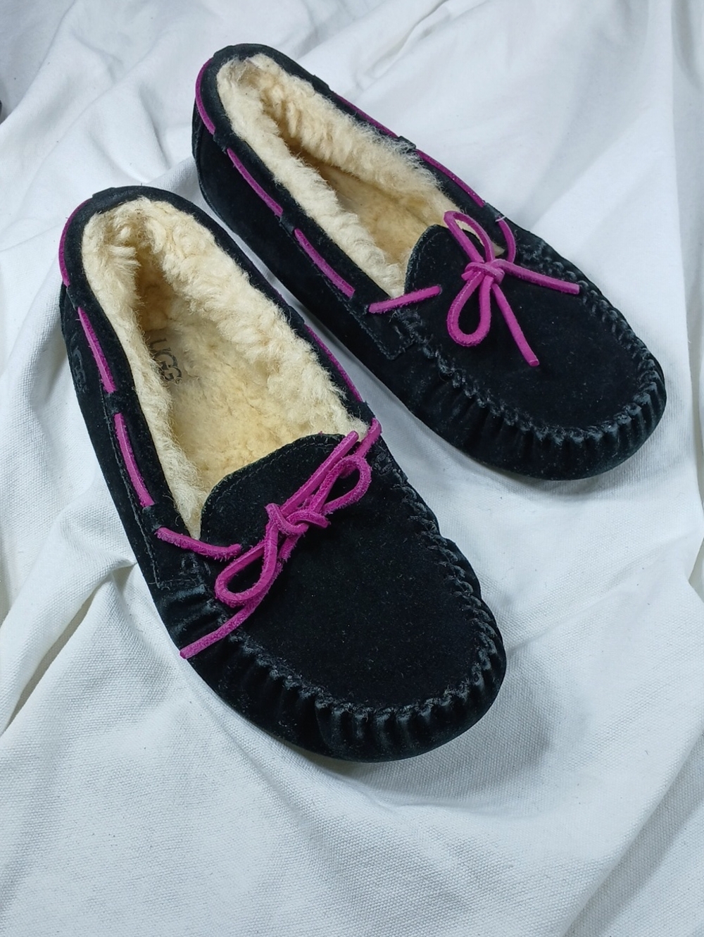UGG Black Moccasin Slippers with Purple Trim and Bow